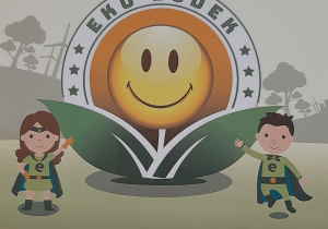 Zdjęcie przedstawia plakat projektu Eko ludek. Na plakacie znajduje się kwiat oraz dwoje dzieci jako symbole projektu.