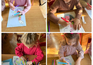 Dzieci kolorują rysunek dinozaura .